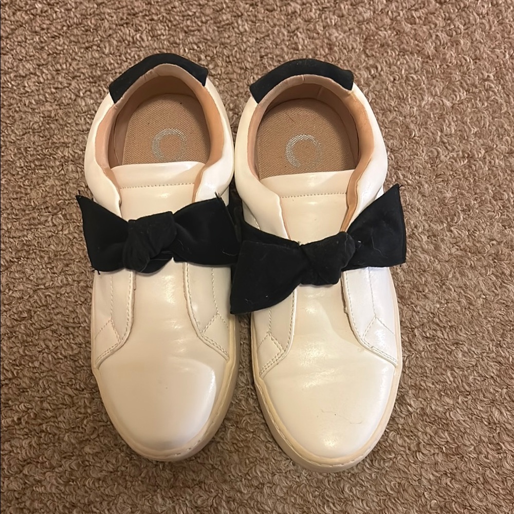 Women’s Black and White Slip Ons